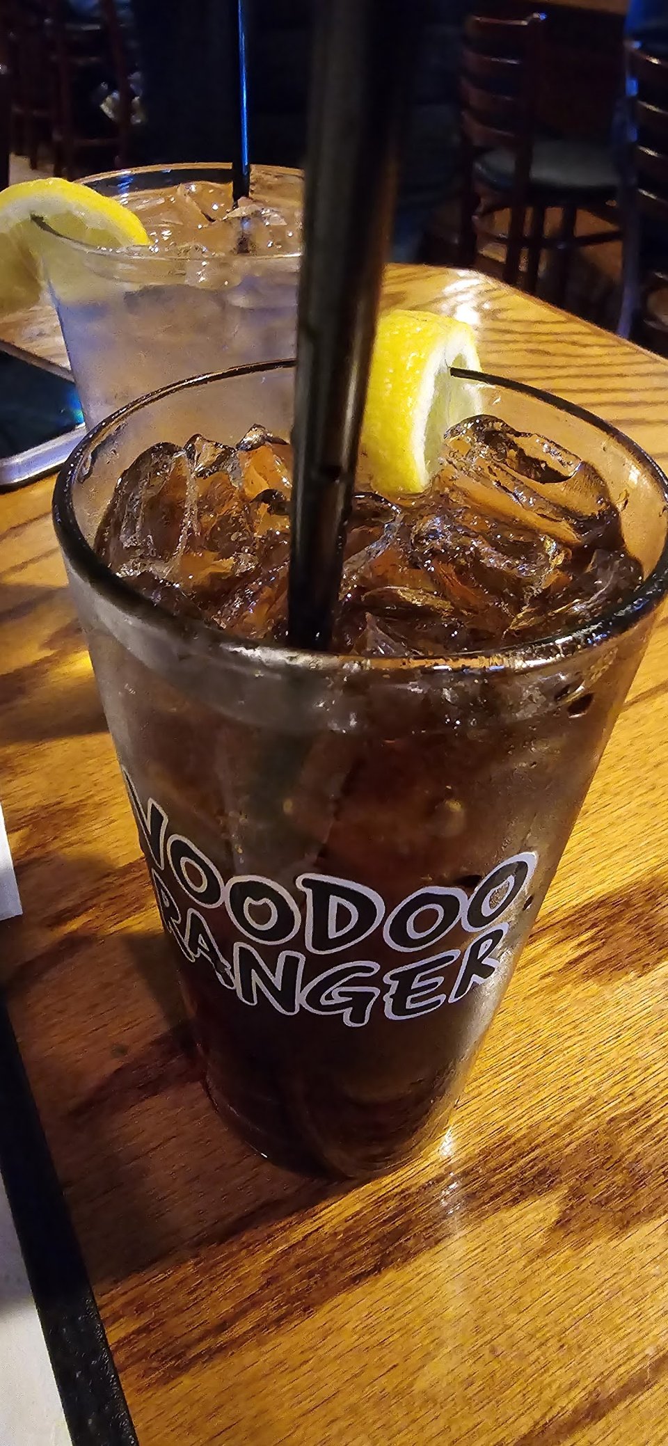 Ice Cold Coca-Cola with Slice of Lemon